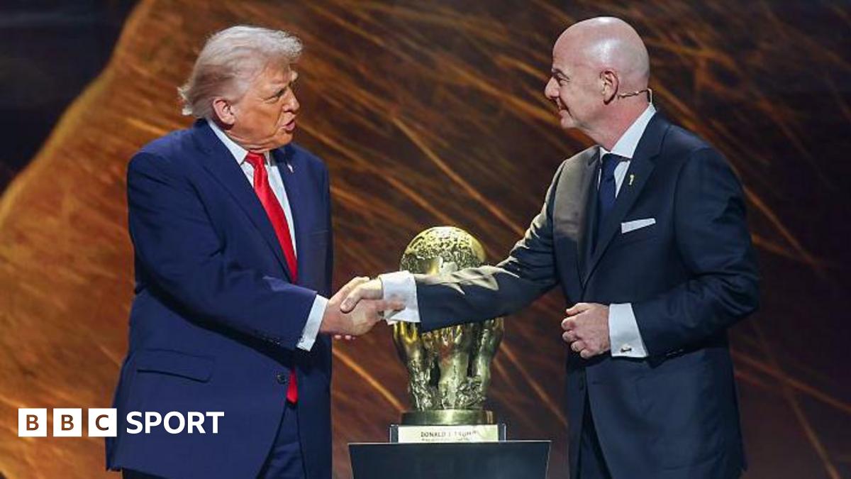Donald Trump and Gianni Infantino shake hands in front of the Fifa peace prize trophy