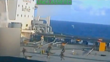 Footage shows US forces taking control of oil tanker off Venezuelan coast – video