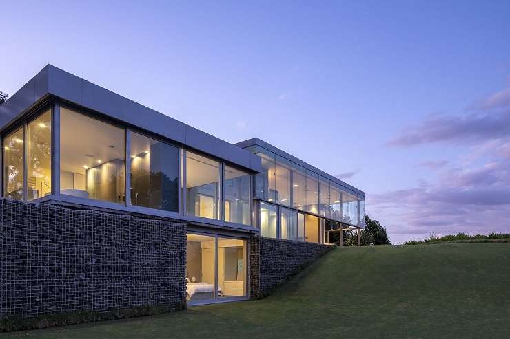 The house at Cliff Road, in Torbay, Auckland, first hit the market in March 2024. Photo / Supplied