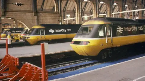 Getty Images A line of InterCity 125 trains in a station taken in the 1980s