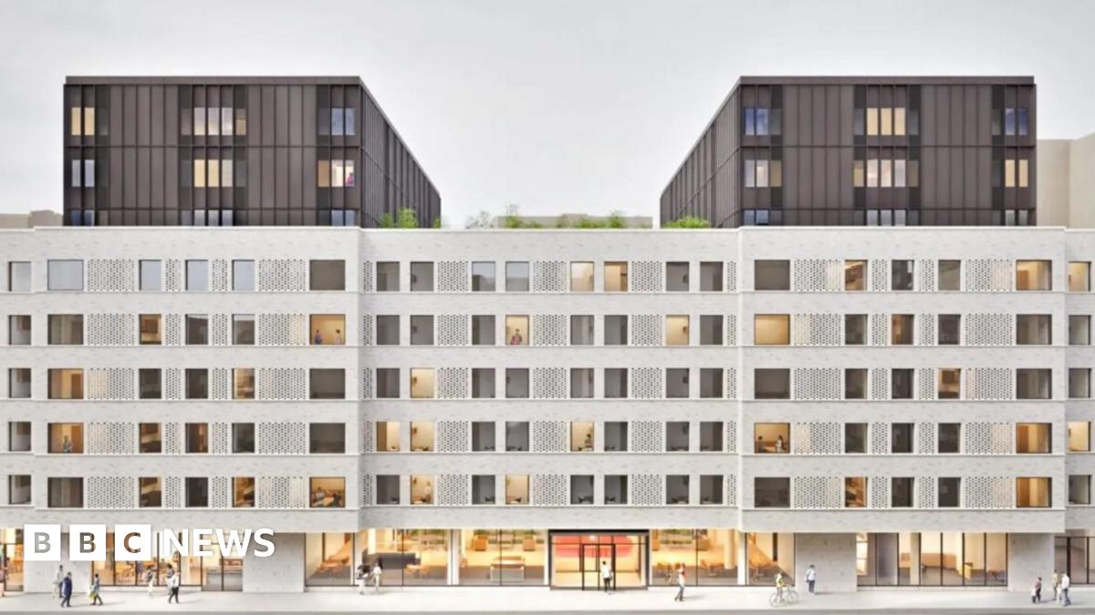 Architectural rendering of a modern multi-storey building with patterned white facade, large windows, and three dark upper blocks, designed for student accommodation.