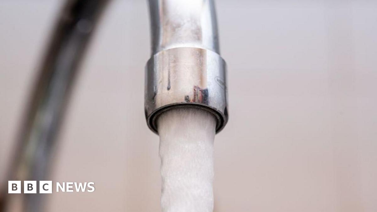 A tap is flowing with water.