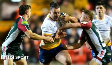 James Lowe carries the ball for Leinster against Leicester
