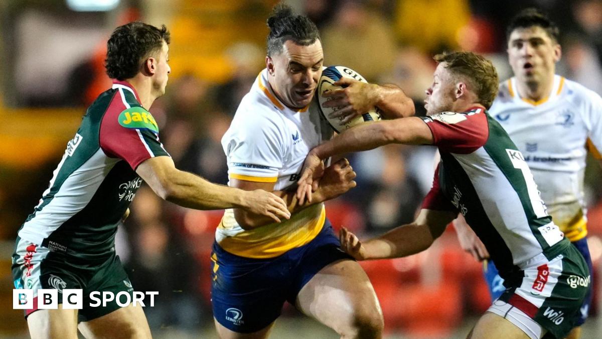 James Lowe carries the ball for Leinster against Leicester