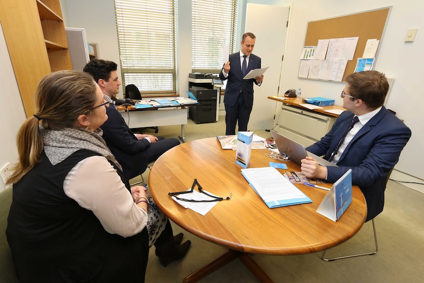 Tim Wilson rehearses his maiden speech among his colleagues.