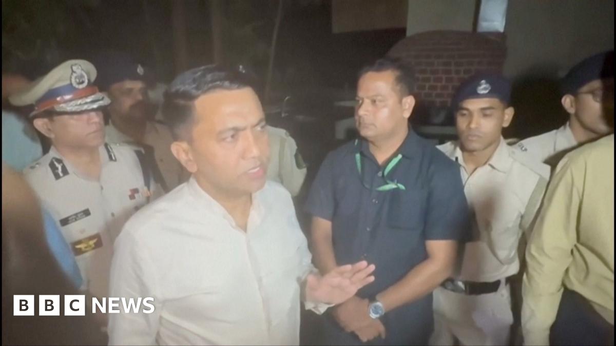 Pramod Sawant, the chief minister of Goa, alongside other police and rescue officials, outside the nightclub fire.