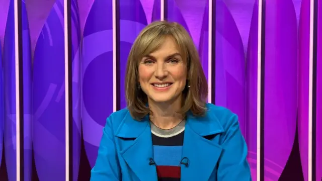 Fiona Bruce - seen in a file picture wearing a turquoise jacket. She is sitting in front of a purple-coloured Question Time set