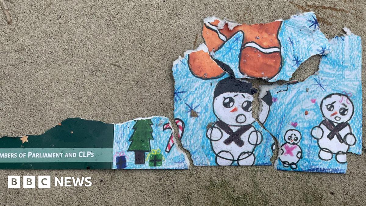 Remnants of a christmas card meant for "Members of Parliament and CLPs" showing childrens' drawings of snowmen, presents under a christmas tree and a sugar cane