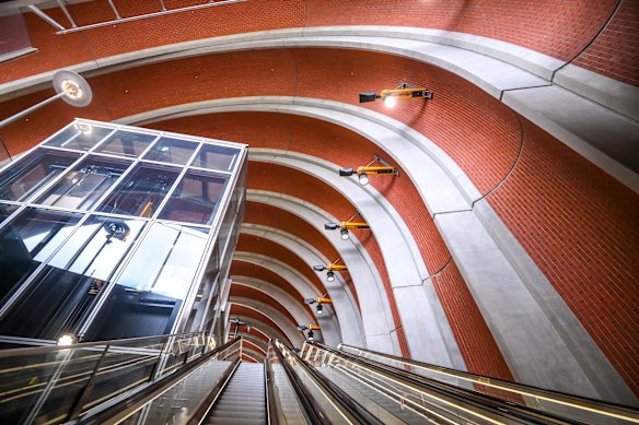 The Arden station entrance features massive concrete arches lined with more than 100,000 hand-laid bricks, reflecting North Melbourne’s rich industrial history.