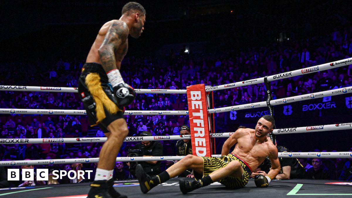 Troy Williamson knocks Callum Simpson down