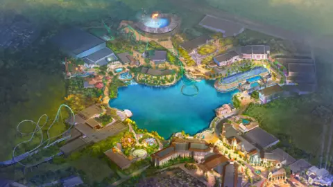 Universal Destinations & Experiences/Comcast An artist's impression of the new Universal Studios theme park has a large body of water in the middle with various rides and lands around the edge.