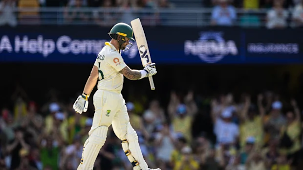 Jake Weatherald celebrates his debut Test 50.