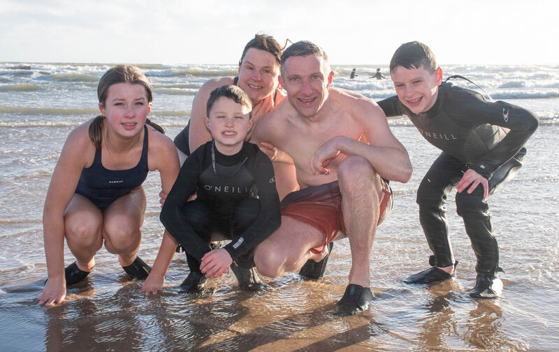 Paddy, Yvonne, Isla, Daithi and Oisin Ryan from Conna seen taking part in the annual Christmas day swim at Youghal. Picture: Howard Crowdy