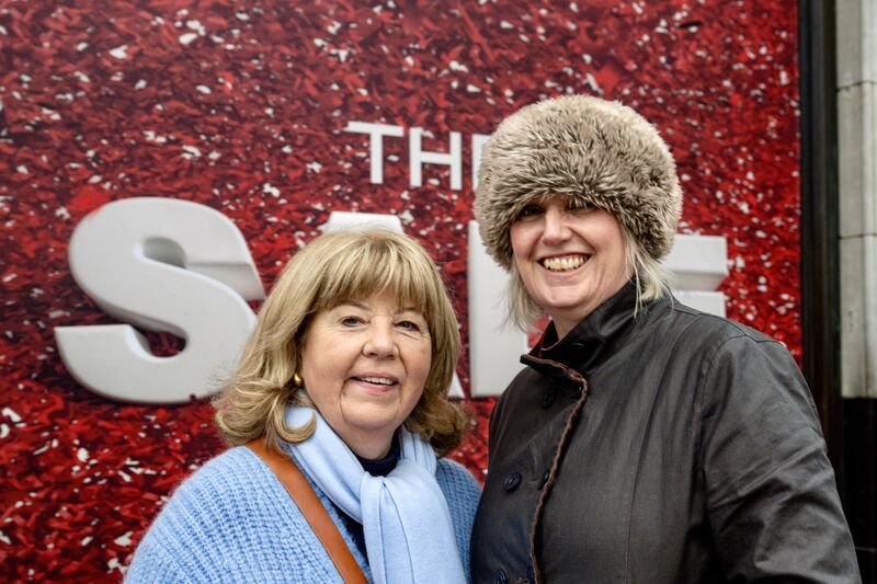 Anne O’Brien and Fiona Maguire wait patiently in the queue outside Brown Thomas on St Patrick's Street.