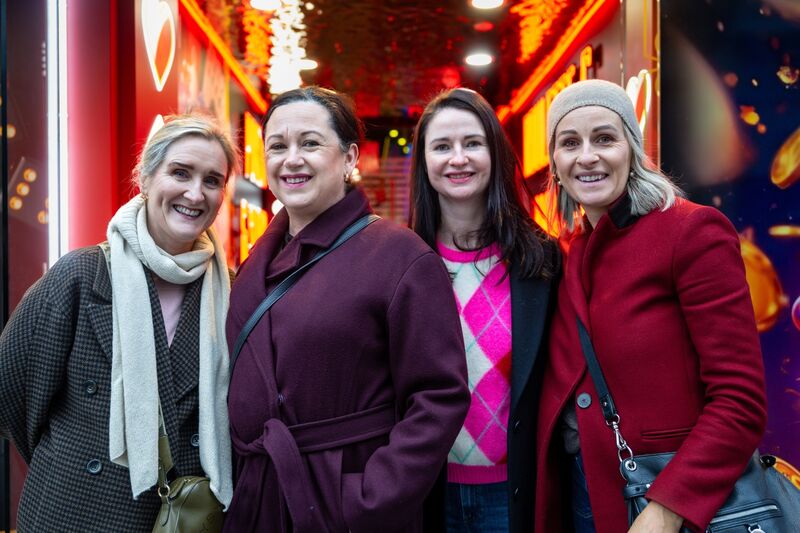 Friends Marion Leblanc, Claire Mackey, Sinéad Crotty and Ciara Daly queue outside Brown Thomas on St Patrick's Street.