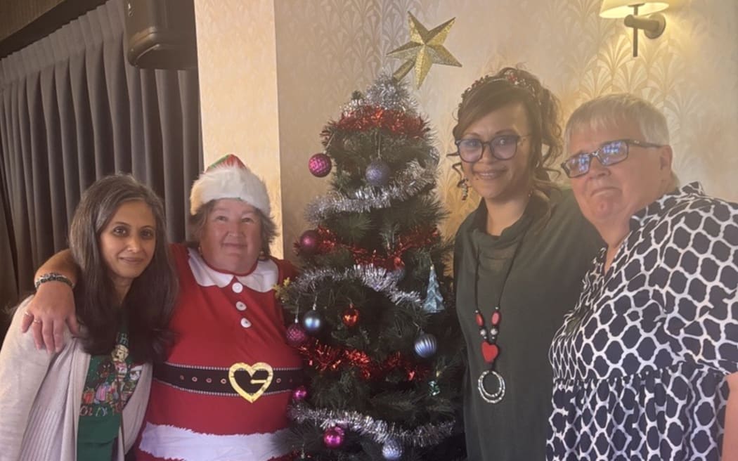 Lions members and volunteers enjoying the Christmas lunch. From left: Gurbakhash Bussan, Janet Burgess, Vicki Waiwai and Antoinette van Riel.