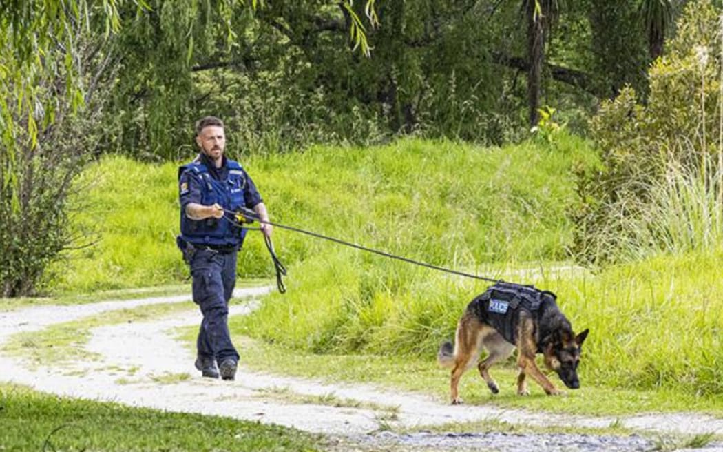 Constable Adam Johannsen and Teo at work tracking.