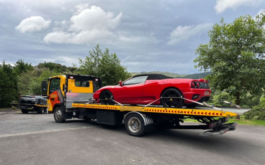 Other assets seized include two Ferrari convertible sports cars.