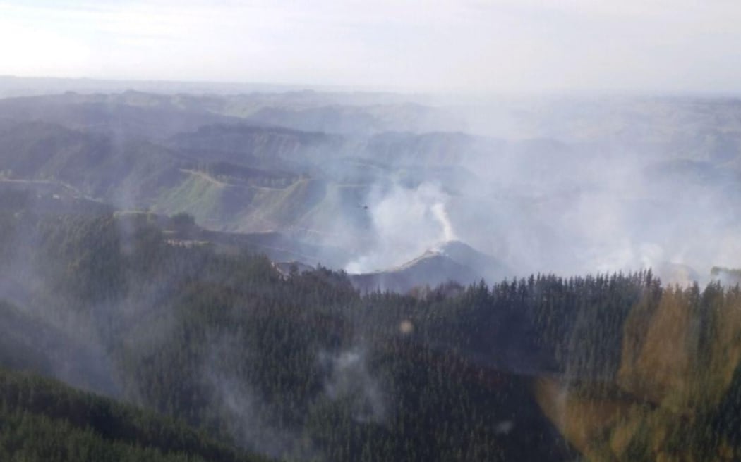 An aerial view of the Lismore Forest fire at 8am Monday 15 December 2025.