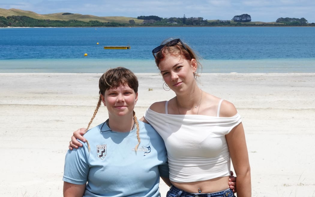 Sisters Alex, 16, and Jasmine Gamman, 18, enjoy a family holiday at Lake Taharoa.