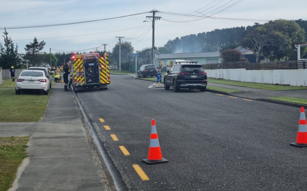 Fire crews have been battling a house fire in Foxton Beach .