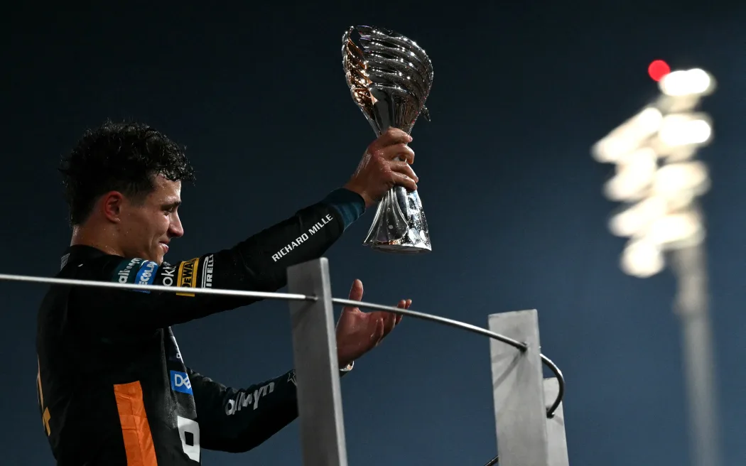 McLaren’s British driver Lando Norris celebrates F1 world title, 2025.