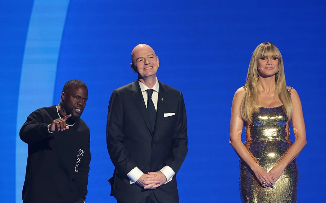 Gianni Infantino, President of FIFA, talks on stage with hosts Heidi Klum and Kevin Hart during the FIFA World Cup 2026 Official Draw.