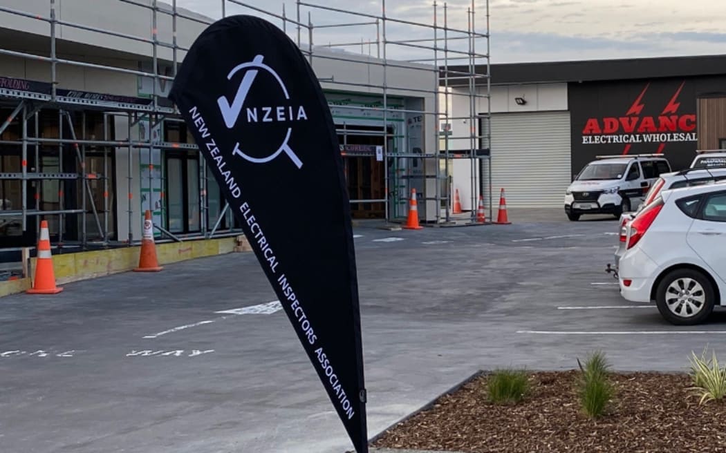 A sign for the New Zealand Electrical Inspectors Association.
