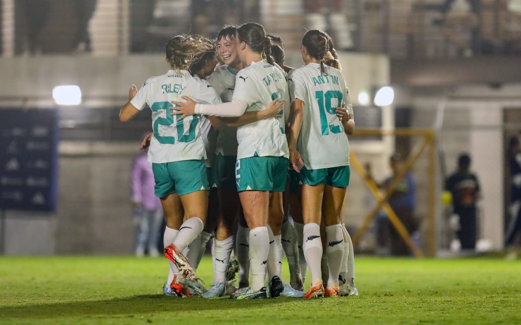 New Zealand Football Ferns players celebrate a goal