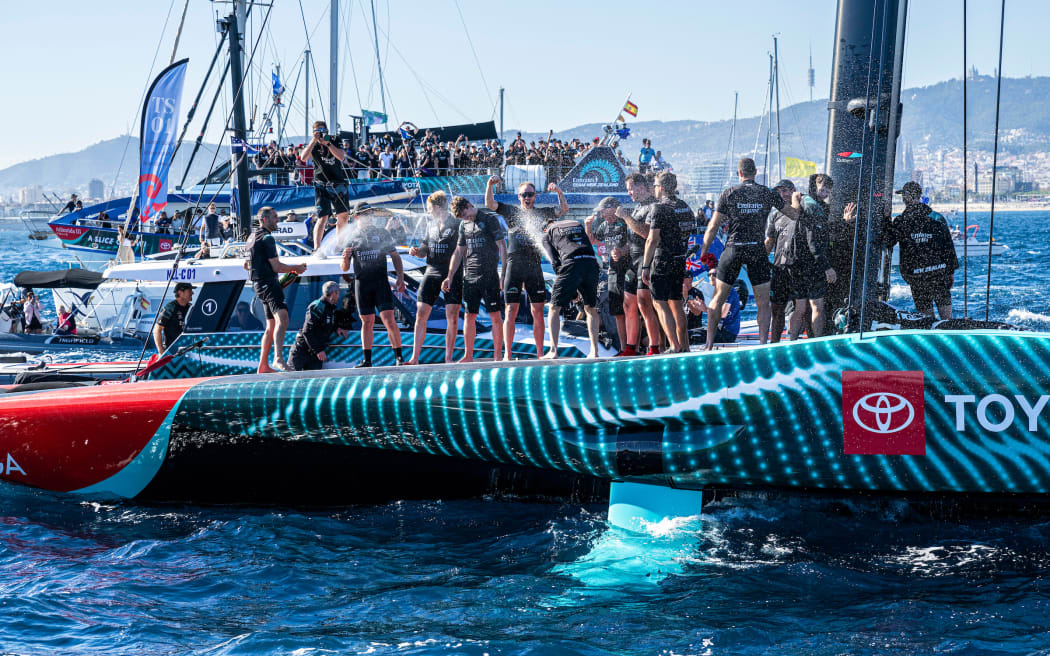 Team New Zealand celebrate winning the final race (race day 6) of the 37th America's Cup, 19 October, 2024.