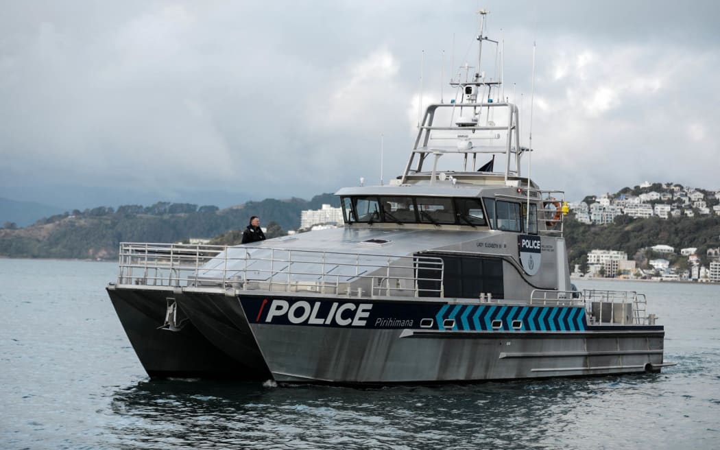 The Wellington police boat returns to harbour on 24 May 2024 after spending the day looking for a man who went missing after falling from the East By West ferry.