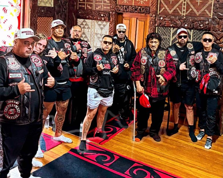 Bronson Edwards (centre) with other patches Mongrel Mob members are a gang event.