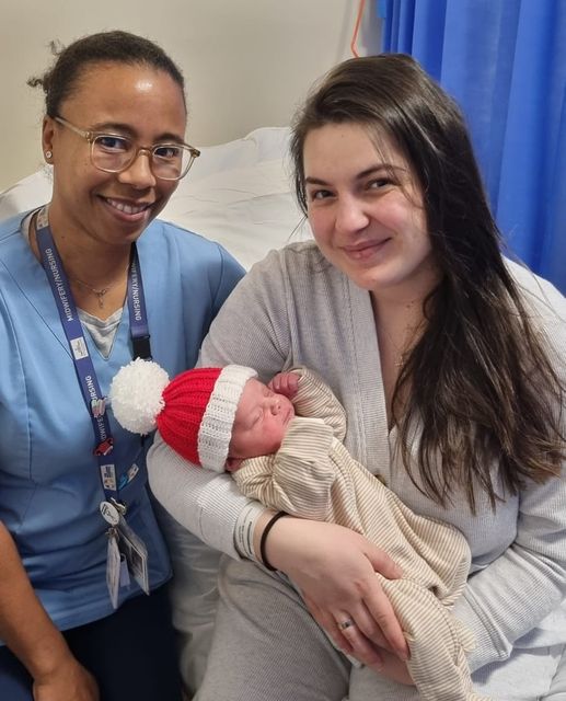 Baby David with his mother Natalia Simciuc and midwife Elsie Cotterill