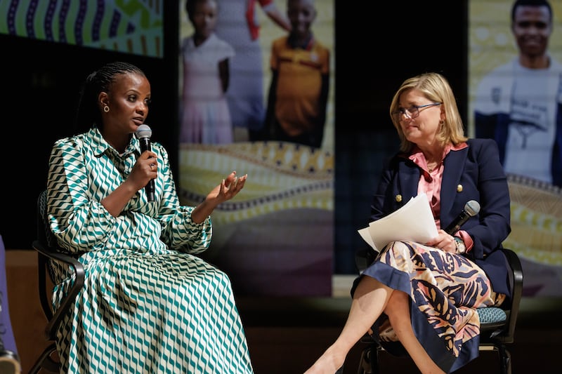 Grace Ninsiima visits with Jane Clayson Johnson at the premiere of the documentary "Pathway to Hope," which features her story and several others and is available to watch on byutv.org.
