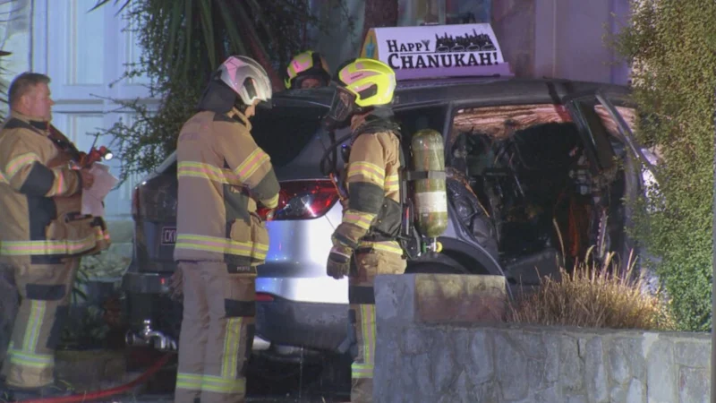 Car with Hanukkah sign set alight on Christmas morning