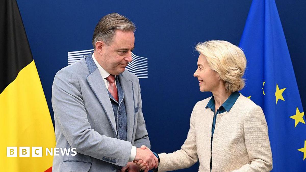 European Commission President Ursula Von der Leyen (R) and Belgium's Prime Minister Bart de Wever shake hands prior to a meeting at the EU headquarters in Brussels on November 14, 2025