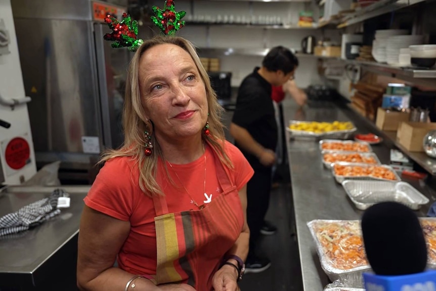 mona a volunteer at the bondi beach surf life club during their christmas luncheon
