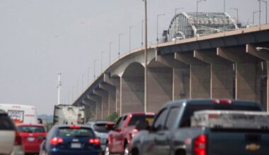 Ontario police say school bus carrying 36 students crashed into car on QEW