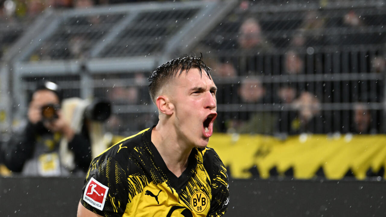 Dortmund beat Hoffenheim to cement third spot