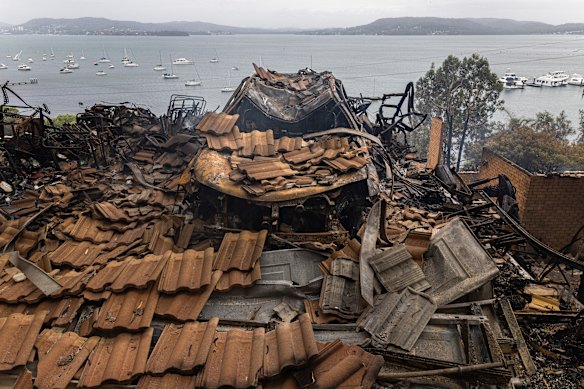 A car destroyed by the fire in a garage built by Steve Foskett