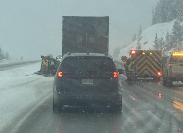 Car flipped on its side on Coquihalla Highway near Lac Le Jeune.