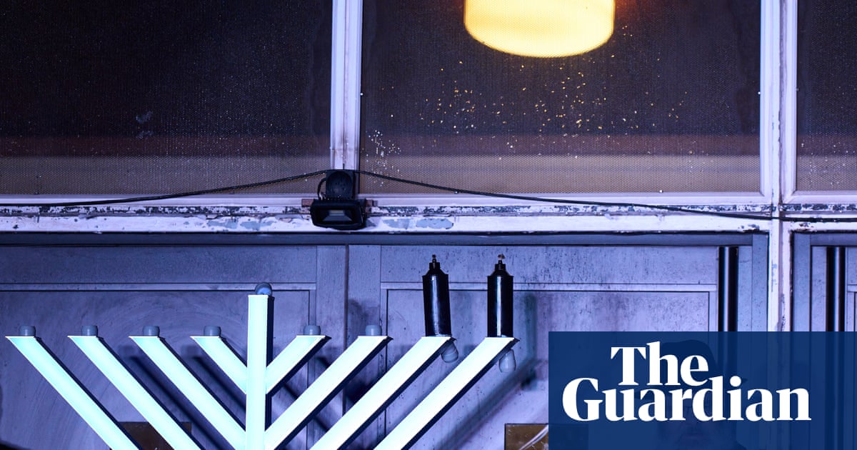‘We are reclaiming that light’: Hanukah celebrations tinged with sadness at Heaton Park synagogue | Manchester