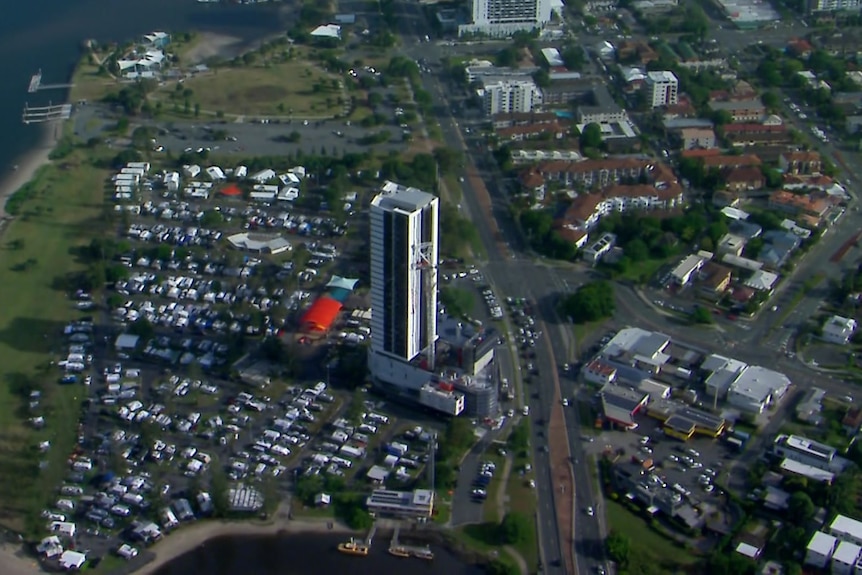 building with crane beside it