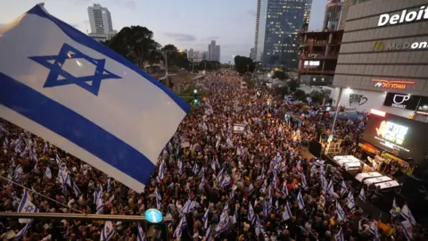 EPA Thousands of people supporting the families of the Israeli hostages held in Gaza take part in a protest outside the Israeli military's headquarters in Tel Aviv, Israel (1 September 2024)
