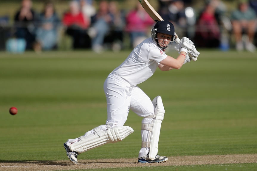 Heather Knight plays a shot.