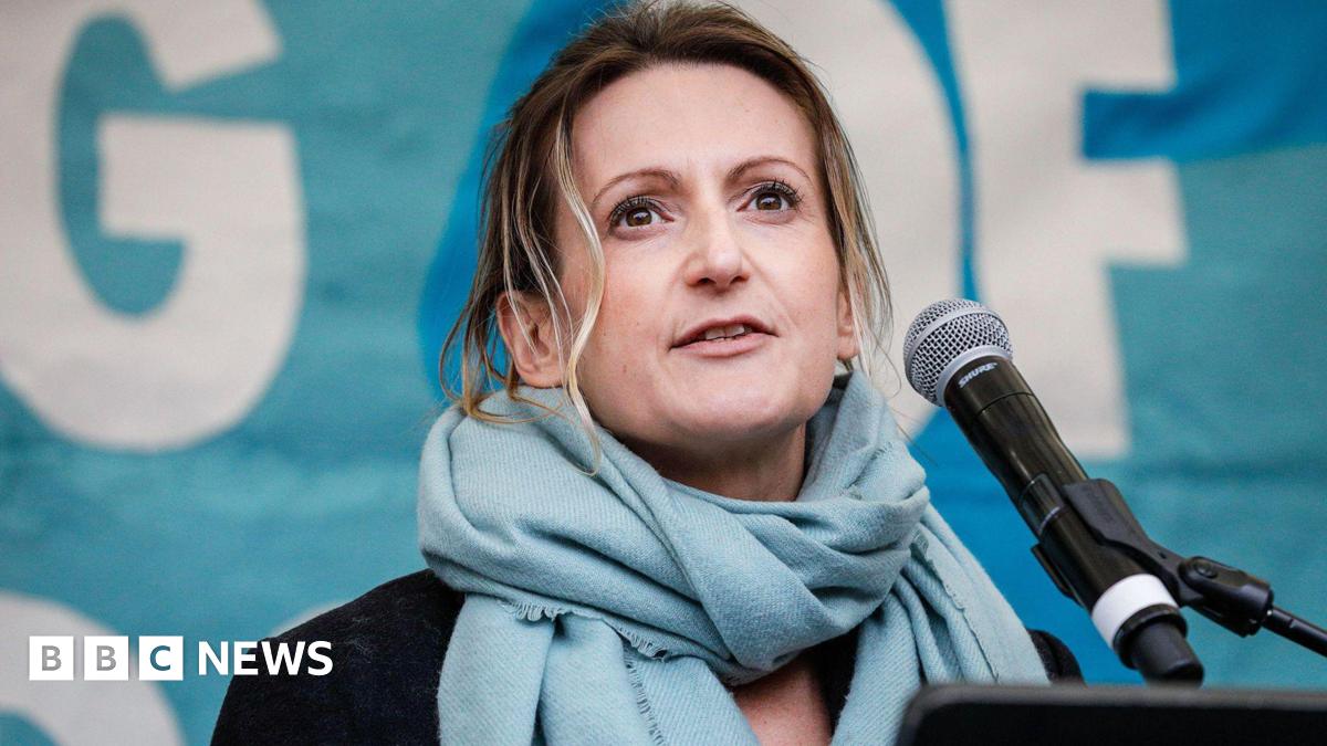 A file photo of Melissa Green speaking into a microphone during an event.