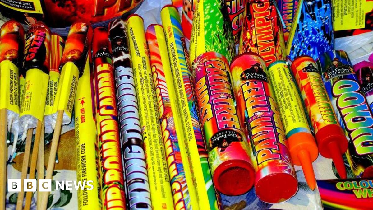A selection of various home fireworks taken on a table top.