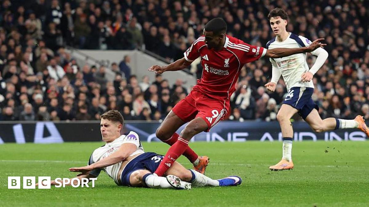Tottenham defender Micky van de Ven tackles Liverpool's Alexander Isak as the Swede scores at Tottenham Hotspur Stadium