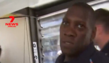 England team security guard clashes with a Seven Network cameraman at Brisbane Airport ahead of the third test against Australia