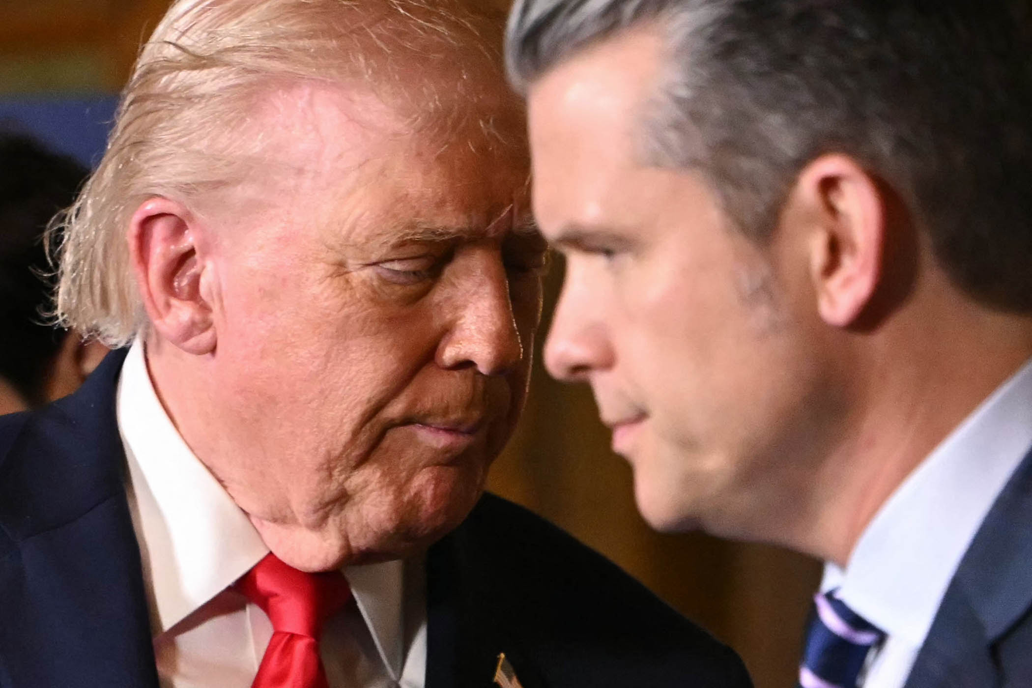 Donald Trump with defence secretary Pete Hegseth
